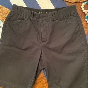 Dockers black above the knee shorts. Size 12.